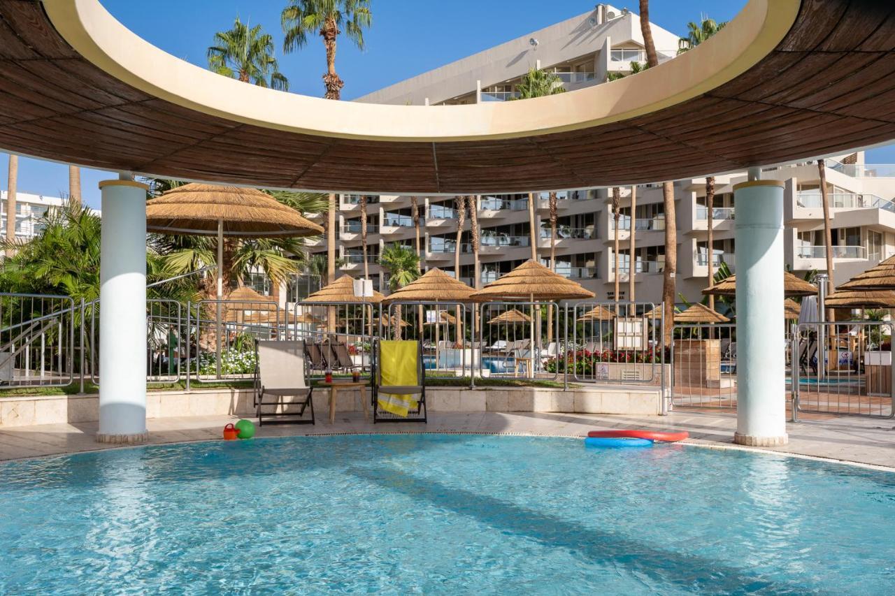 อาเรีย Hotel เอลัต ภายนอก รูปภาพ The pool at the Hilton Anatole